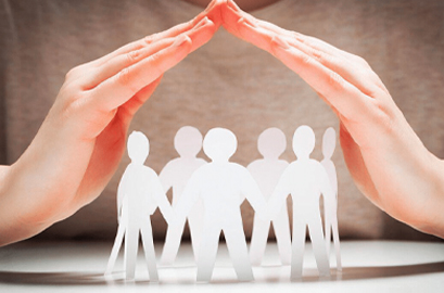 A cutout of people in a circle and someone's hands on the top | Franklins Training Services